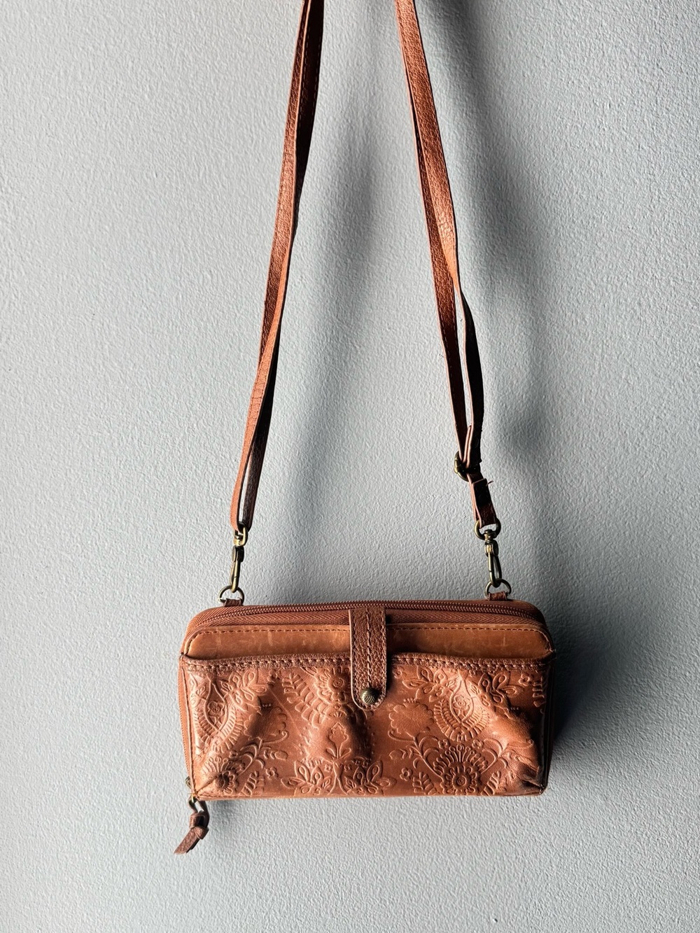 The Sak Embossed Tan Leather Crossbody Wristlet